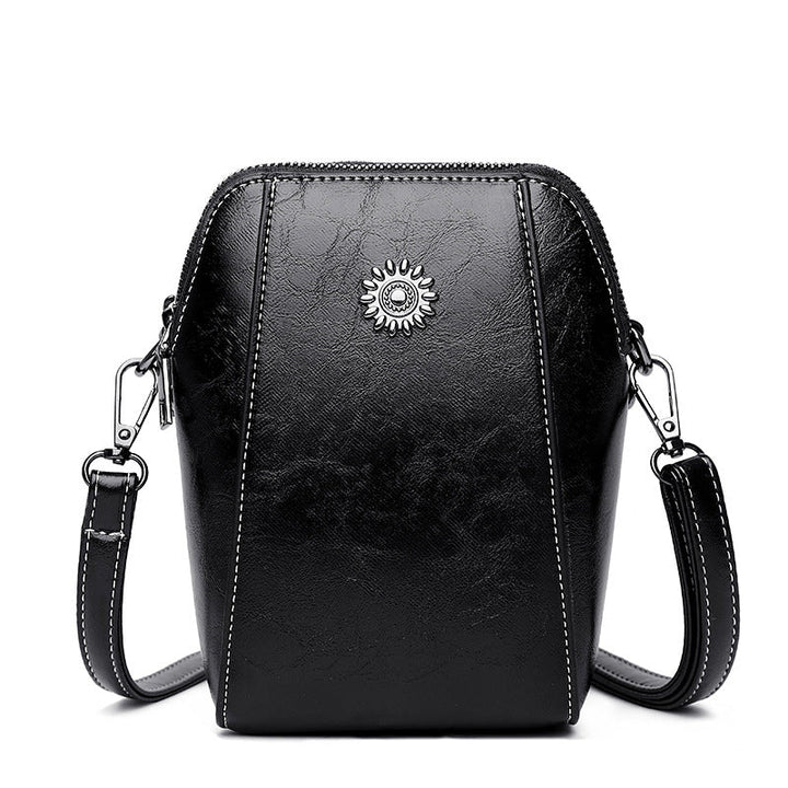 Vienna | Kompakte einfarbige Mini-Handtasche