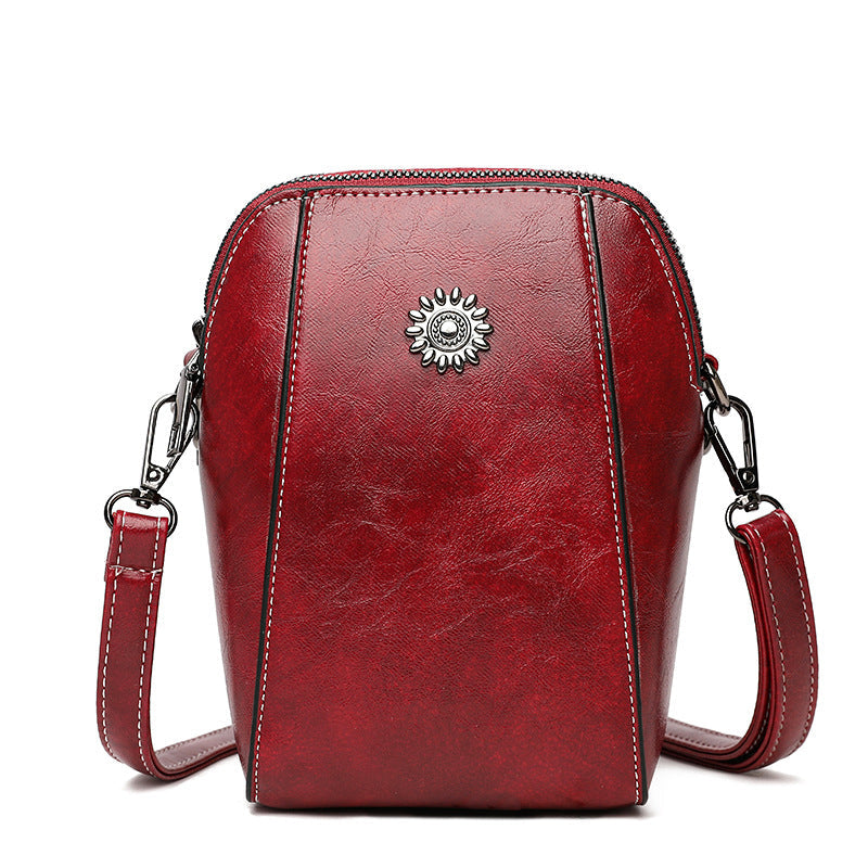Vienna | Kompakte einfarbige Mini-Handtasche